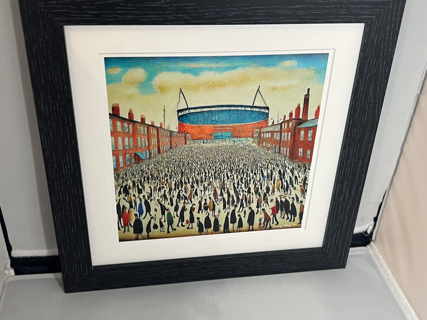 The "Blue" Stadium - Giclée Art Print 12" Square Framed. Stylish Image in the Style Of LS Lowry. Ideal Gift.