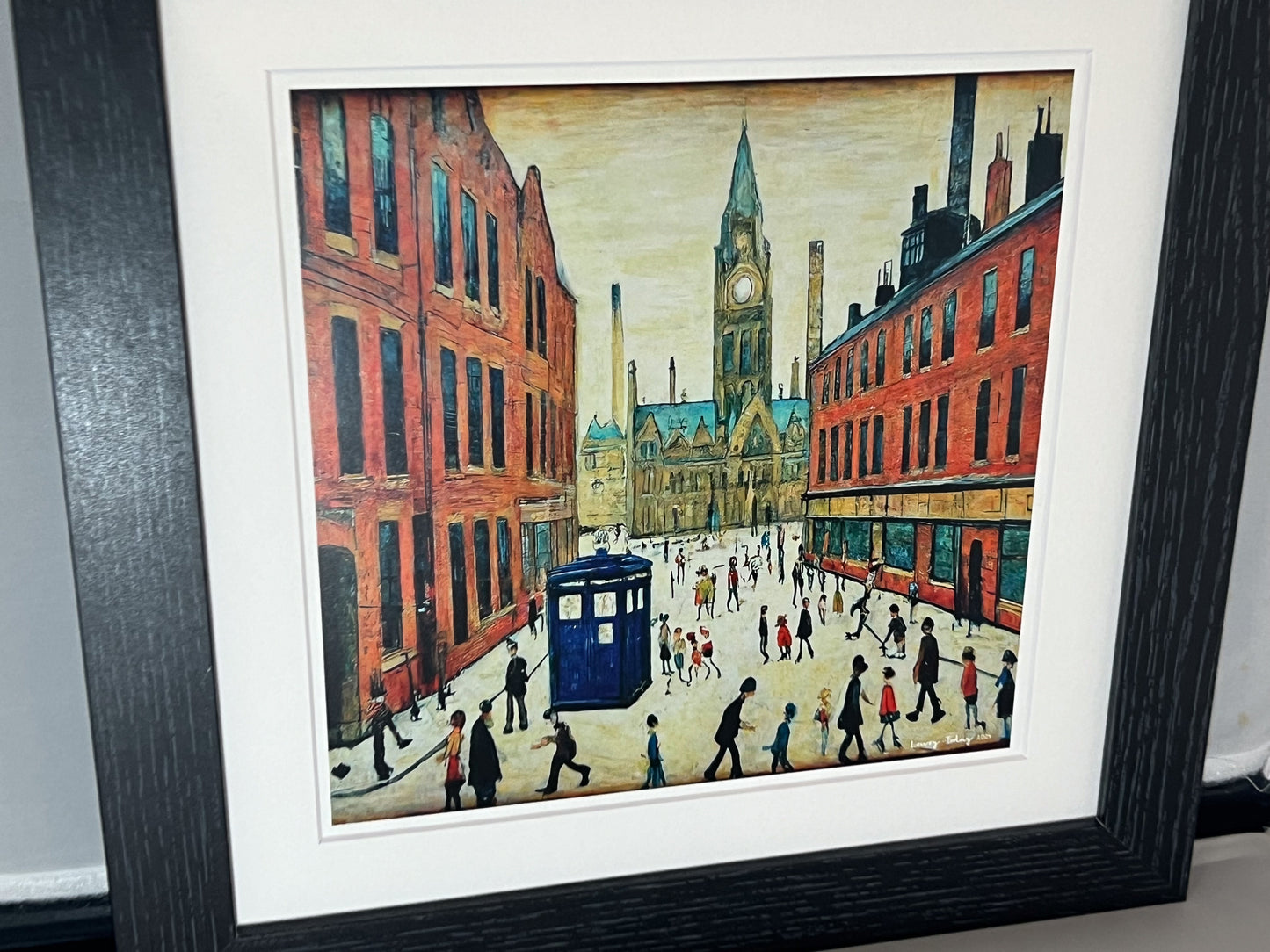 The Doctor Who Comes To Town - Giclée Art Print 12" Square Black Frame. Stylish Image in the Style Of LS Lowry. Ideal Gift.