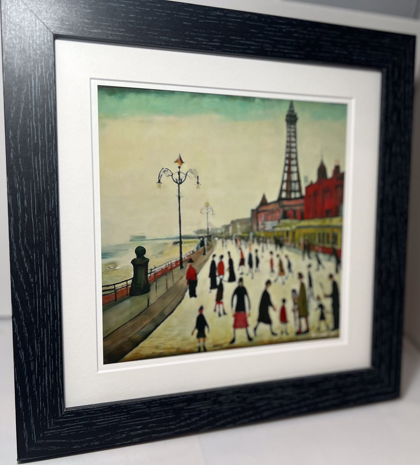 Blackpool Front Giclée Art Print 12" Black Square framed. Enchanting Image in the Style Of LS Lowry